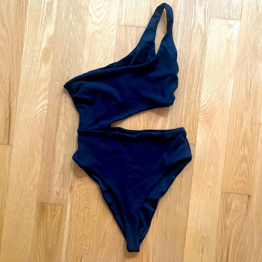 Noize black ribbed one piece asymmetrical swimsuit.